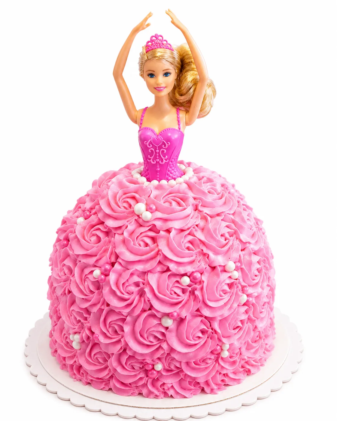 Pink Barbie doll cake covered in rosette piping and pearl details
