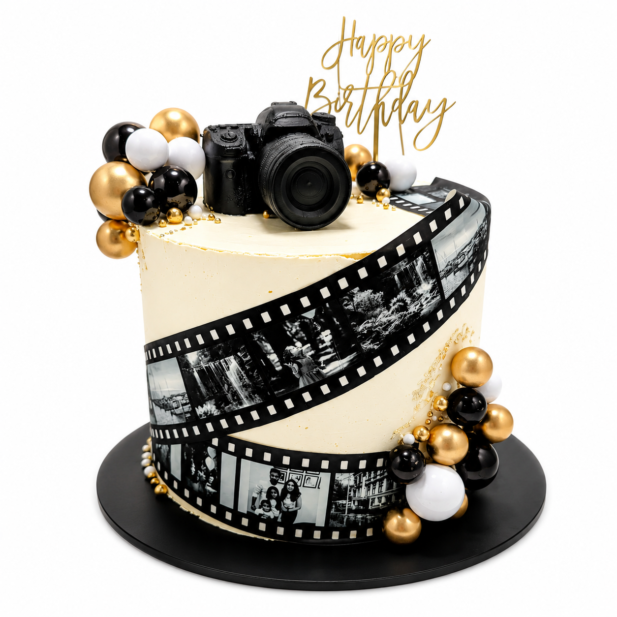 Novelty photographer birthday cake with edible film strip and camera topper