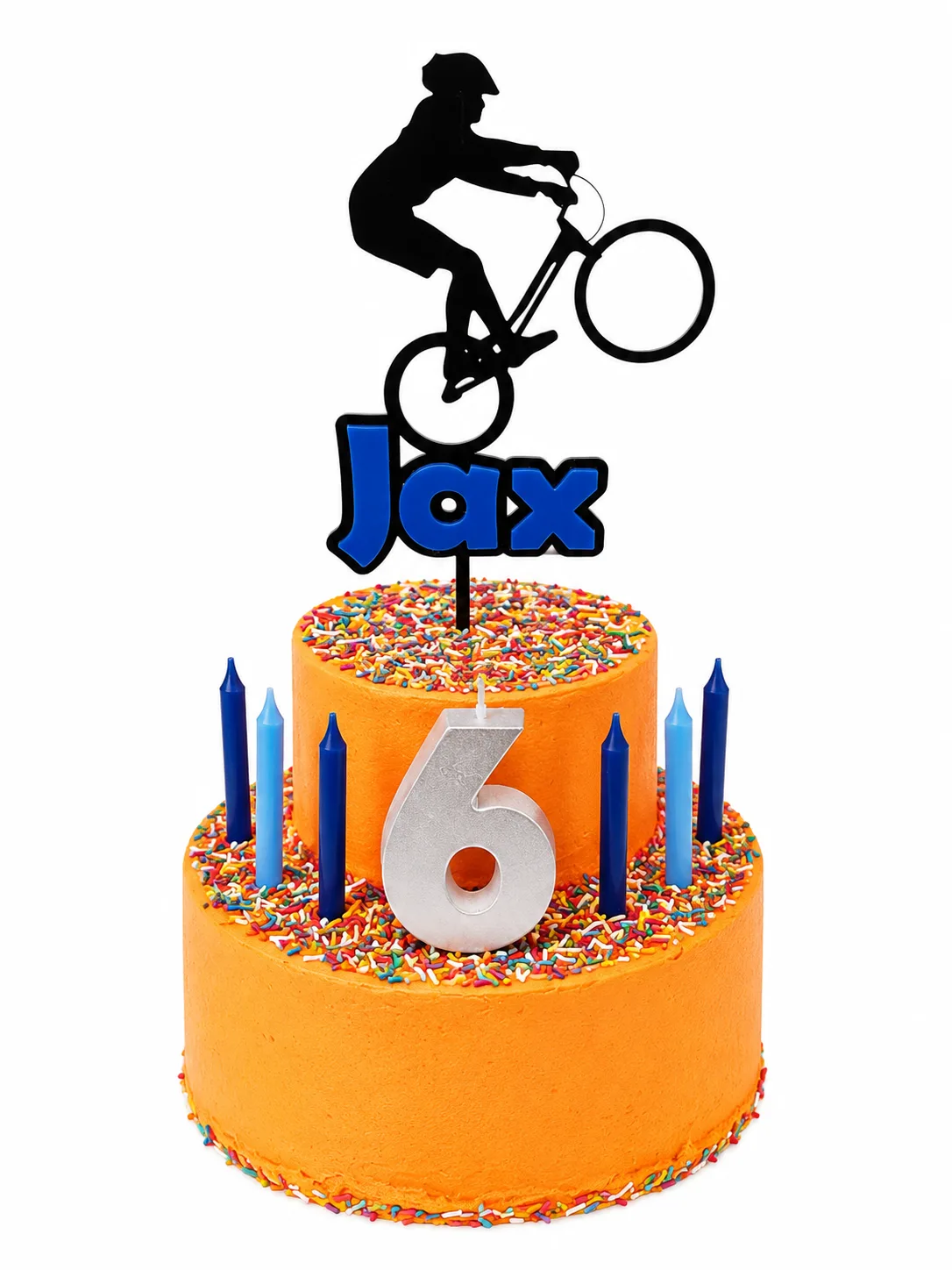 Orange two tier BMX themed birthday cake with bike rider topper